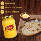 Jar of Bhagat Prasadam with roti and chutney on a wooden background